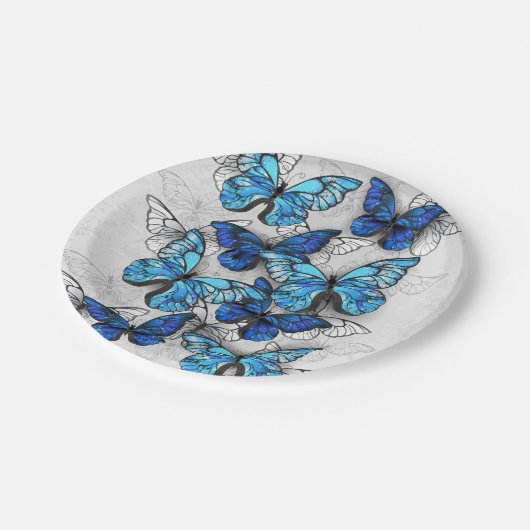 Compositie van witte en blauwe vlinders papieren bordje (Gekanteld)
