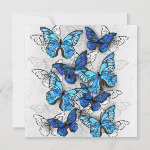 Compositie van witte en blauwe vlinders save the date