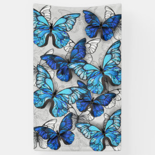 Compositie van witte en blauwe vlinders spandoek