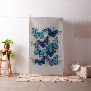 Compositie van witte en blauwe vlinders stof