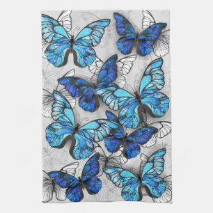Compositie van witte en blauwe vlinders theedoek