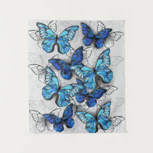 Compositie van witte en blauwe vlinders wandkleed