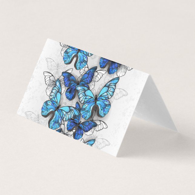 Composition de papillons blancs et bleus (Front)