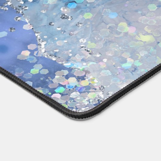 Conception abstraite de parties scintillant bleues (Coin)