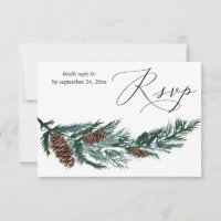 Cône de pin d'hiver et verdure avec repas RSVP
