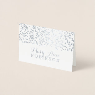 Confettis en baisse argentés de carte d'endroit