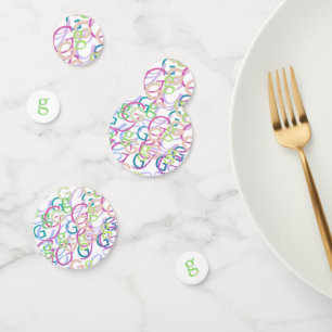 Confettis en forme de lettre "G"