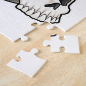 Cook met pet op de borst legpuzzel (Zijkant)