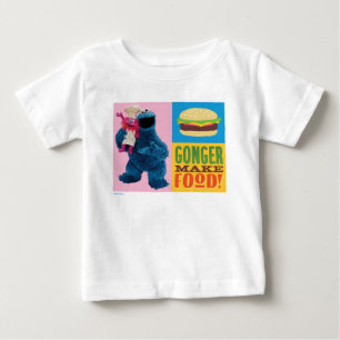 Cookie Monster's Foodie Truck Gonger maakt eten