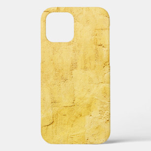 Coque iPhone 12 plâtre texturé abstrait jaune clair sur le mur