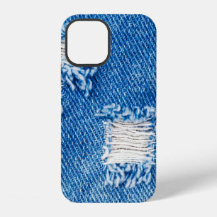 Coque iPhone 12 Trou sur un jean en denim. Jean bleu déchiré détru