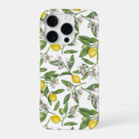 Branches de citron avec fleurs et fruits sur blanc