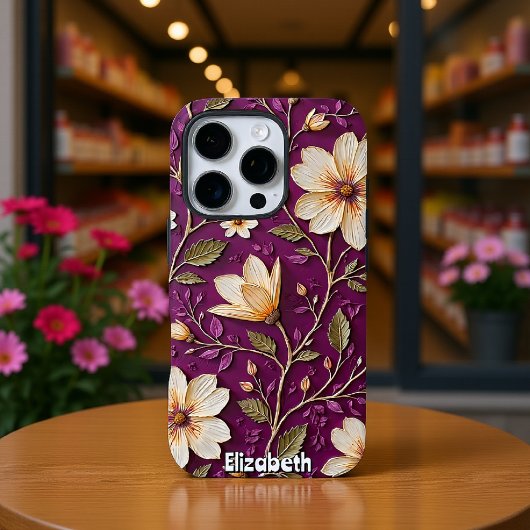 Coque iPhone 16 Pro Fleurs crème sur fond violet texturé