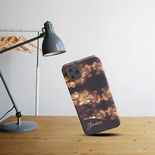 Coque iphone aurifère de lumières de livre