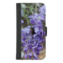 Fleur pourpre de glycines avec la photo d'abeille