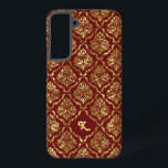 Coque Samsung Galaxy Élégant Motif en or métallique sur rouge foncé<br><div class="desc">Impression de texture or métallique,  damas vintages à fleurs avec un arrière - plan rouge foncé personnalisé. monogramme personnalisable.</div>