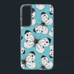 Coque Samsung Galaxy Motif papillon de choux<br><div class="desc">Design motif fait de papillons de chou sur arrière - plan bleu.</div>