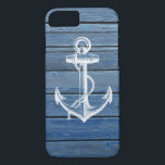Coques Pour iPhone Ancre blanche et bois bleu vintage<br><div class="desc">Une ancre et un cru blancs se sont fanés les panneaux en bois bleus. Une conception populaire sur l'arrière - plan en bois de texture. Le cadeau unique parfait pour chaque occasion</div>