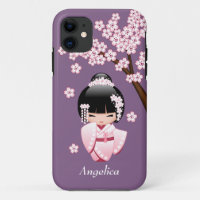 Kokeshi Doll au kimono rose sur fond violet