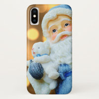 Le Père Noël en costume bleu