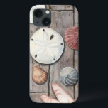 iPhone 13 Coque Les trésors marins<br><div class="desc">Megan Meagher est connue pour ses oeuvres d'art simples. Cette image montre la simplicité des trésors du bord de mer, dont les dollars de sable et les coquillages dans un ton pastel. Meagher embrasse à son image un arrière - plan en bois pour contraster ces trésors. Obtenez cette impression fine...</div>