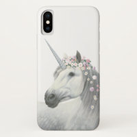 Licorne d'esprit avec des fleurs dans la crinière