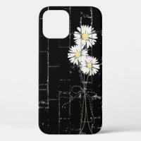 marguerites blanches sur brique noire