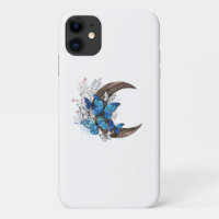 Papillons bleus sur croissant en bois
