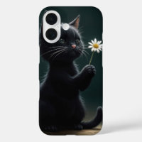 Petit chaton noir avec une marguerite blanche