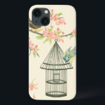 iPhone 13 Case Petits oiseaux étés perché sur une branche et sur<br><div class="desc">Nancy Slocum ont peint beaucoup d'oiseaux tout au long des années. Cette image dépeint deux petits oiseaux bleus et jaunes étés perché sur une branche entourée les fleurs roses et en semblant curieuse au sujet d'une cage à oiseaux. Obtenez ce morceau oiseau-orienté frais d'art sur votre produit de Zazzle aujourd'hui....</div>