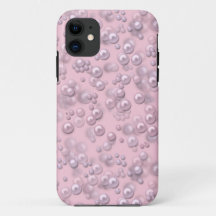 Placers de perles blanches roses sur velours rose