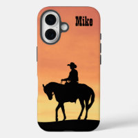Silhouette de cowboy au coucher du soleil