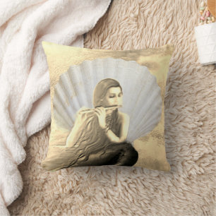 Coquillage et femme jouant de la flûte coussin déc