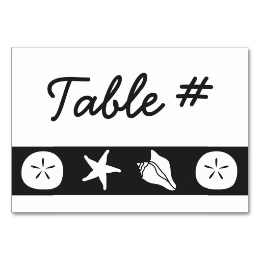 Coquillages d'été sur carte de table noire (Devant)