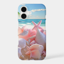 COQUILLES PINK PASTEL SUR UNE PLAGE DE SABLE