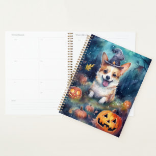 Corgi d'Halloween avec citrouilles effrayant