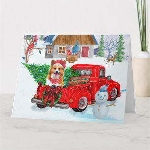 Corgi-hond in kerstbezorgingswagen sneeuw kaart
