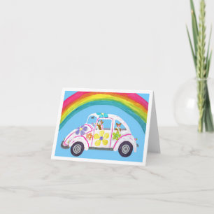 Corgi's in Hippieauto op het Strand met een Regenb