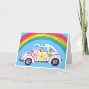 Corgi's in Hippieauto op het Strand met een Regenb Kaart