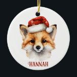Coupe Fox personnalisées ornement de Noël<br><div class="desc">Ajoutez de la magie boisée à votre arbre de vacances avec ce ornement de Noël renard personnalisé! Doté d’un charmant renard aquarelle dans un chapeau de Père Noël rouge avec des détails de flocon de neige, et du nom de votre enfant imprimé ci-dessous dans un script festif, cet ornement en...</div>