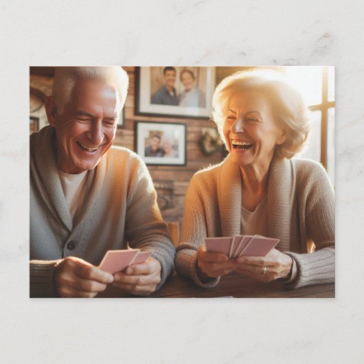 Couple Plus Âgé Jouer Des Cartes (Devant)