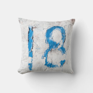 Coussin 18 texte sur mur