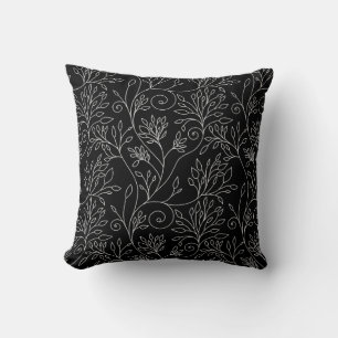 Coussin à fleurs noir et blanc
