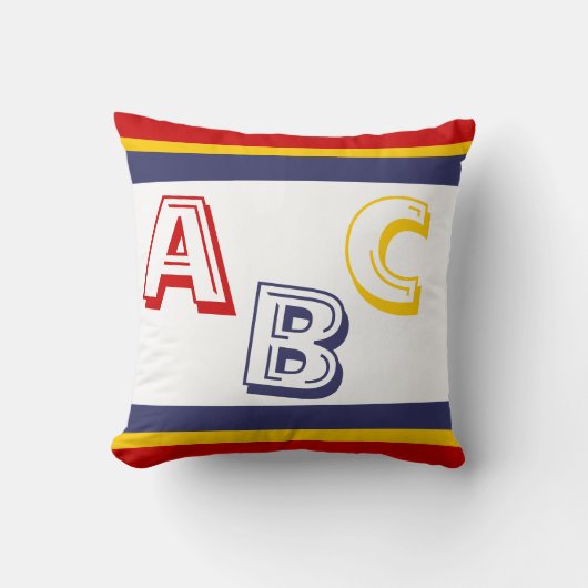 Coussin ABC bleu, jaune et rouge marine sur blanc (Recto)