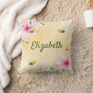 Coussin Abeilles à nid d'abeille jaune fleuron rose nom