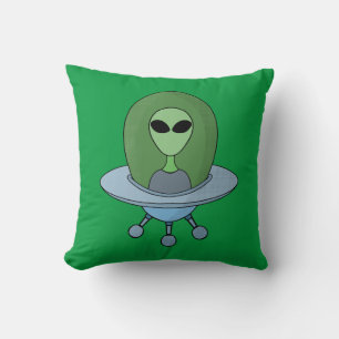 Coussin Alien dans son petit vaisseau spatial