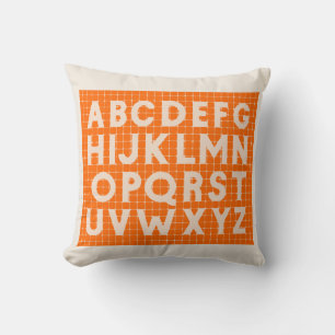 Coussin Alphabet orange et beige mignon sur le papier de