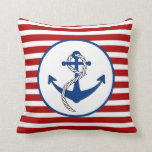 Coussin Ancre à thème nautique<br><div class="desc">Ancrage de bateau avec corde en bleu marine avec bandes horizontales marron.</div>