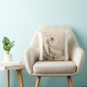 Coussin ange chrétien assis sur une pierre (Chaise)