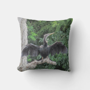Coussin Anhinga ensoleillé sur une branche moussue